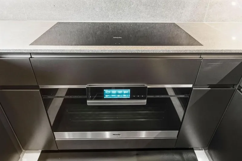 Slide: The Image of Modern kitchen with Custom Line 120 oven, sleek design, touch controls, 2018 model. - 67