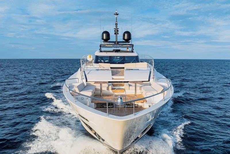 Slide: The Image of Luxurious 2018 Custom Line 120 yacht cruising on open sea under clear blue sky. - 7