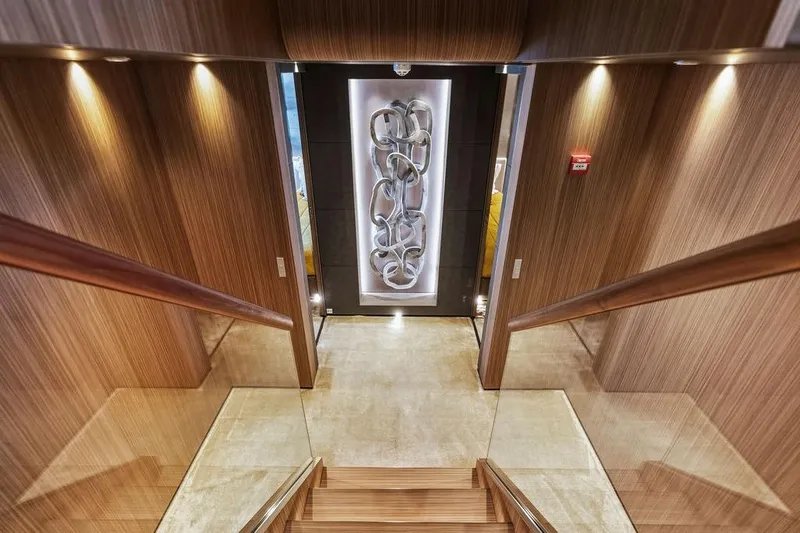Slide: The Image of Luxurious yacht interior with wooden staircase and modern art, Custom Line 120, 2018. - 72