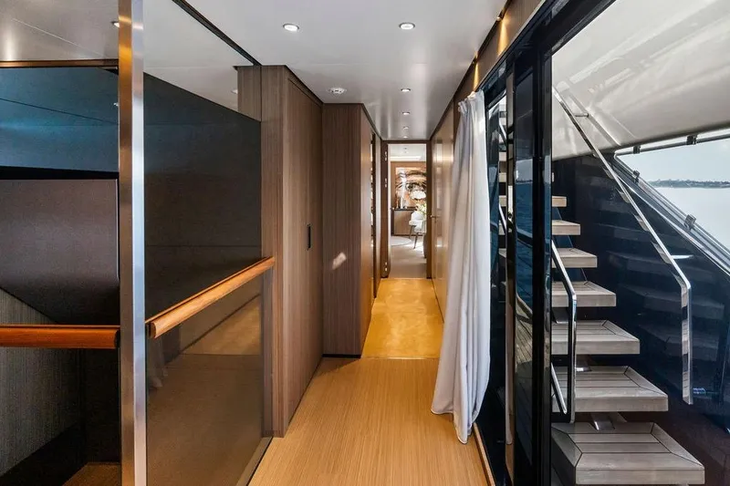 Slide: The Image of Luxurious interior of 2018 Custom Line 120 yacht with modern design and elegant staircase. - 73