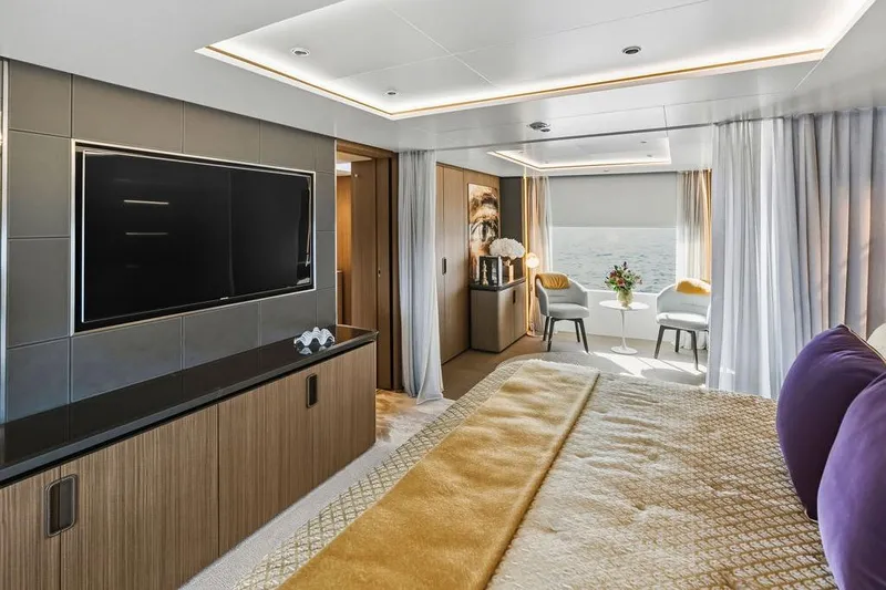Slide: The Image of Luxurious 2018 Custom Line 120 yacht bedroom with modern decor and ocean view. - 79