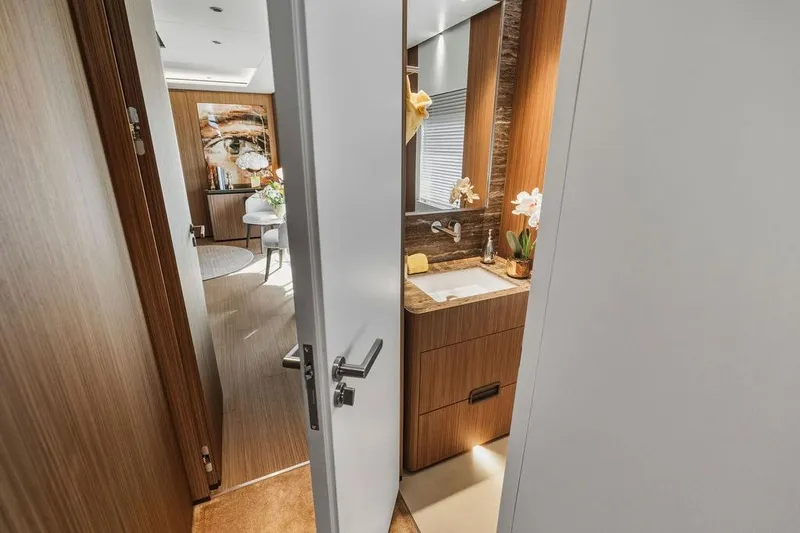 Slide: The Image of Luxurious 2018 Custom Line 120 yacht interior with modern bathroom and elegant decor. - 85