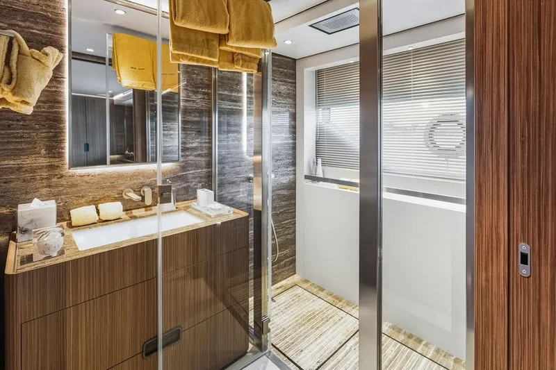 Slide: The Image of Luxurious yacht bathroom with modern design, wooden accents, and elegant fixtures, Custom Line 120, 2018. - 92