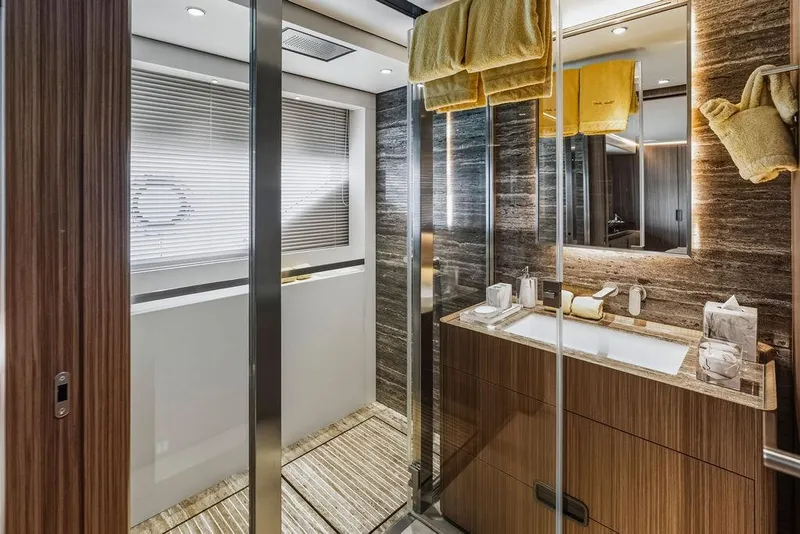 Slide: The Image of Luxurious yacht bathroom with modern design, wooden accents, and elegant fixtures, Custom Line 120, 2018. - 98