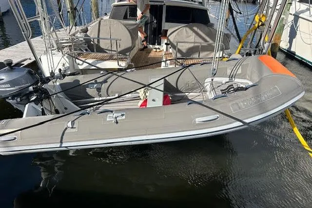 Slide: The Image of Deck controls on a 2013 Beneteau Sense 46 sailboat, featuring labeled lines and cleats. - 25