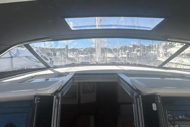 Slide: The Image of Bathroom interior of 2013 Beneteau Sense 46 yacht, featuring modern shower and sink. - 37