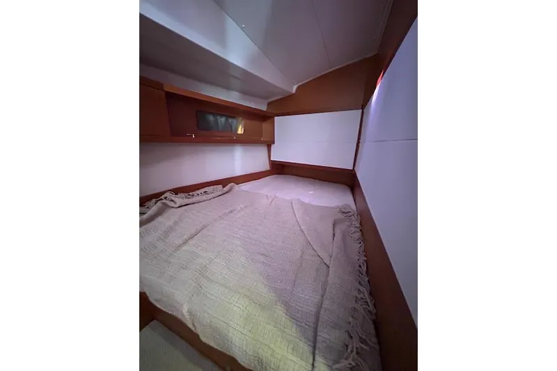 Slide: The Image of Modern kitchen in 2013 Beneteau Sense 46 yacht with sink, stove, and microwave. - 41