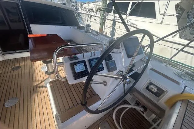 Slide: The Image of Interior wooden steps of 2013 Beneteau Sense 46 yacht, leading to deck. - 44