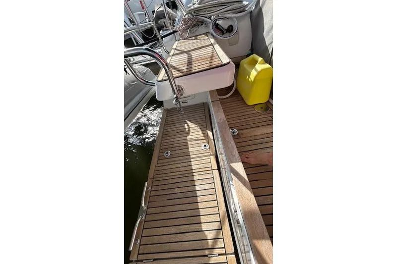 Slide: The Image of Open refrigerator inside 2013 Beneteau Sense 46 yacht, featuring shelves and door compartments. - 46