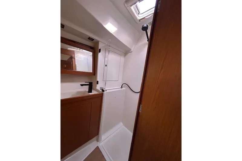 Slide: The Image of Luxurious interior of 2013 Beneteau Sense 46 yacht with modern seating and decor. - 51