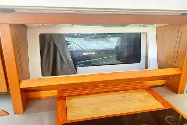 Slide: The Image of Luxurious interior of 2013 Beneteau Sense 46 yacht with modern seating and decor. - 55