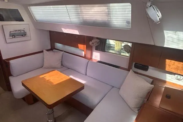 Slide: The Image of Luxurious interior of 2013 Beneteau Sense 46 yacht with modern seating and decor. - 56