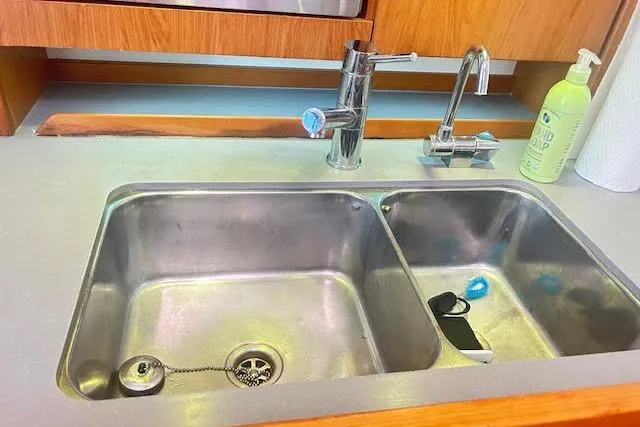 Slide: The Image of Interior of 2013 Beneteau Sense 46 yacht with modern seating and control panel. - 58