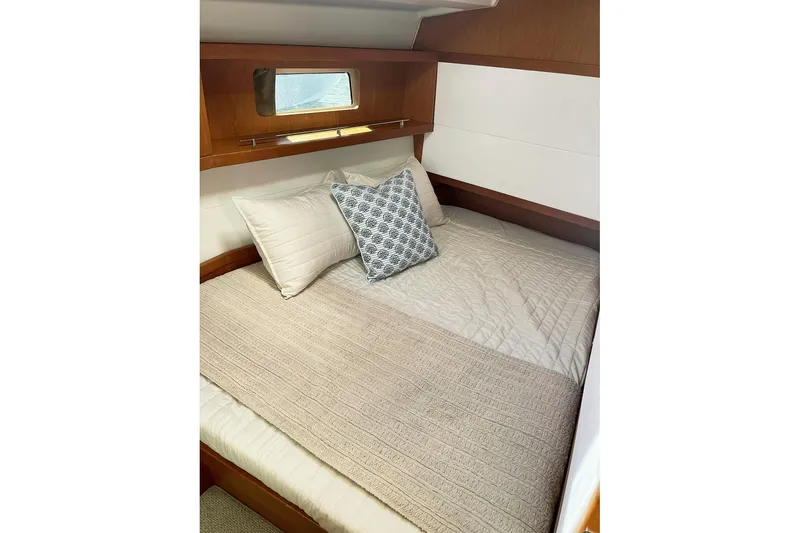 Slide: The Image of Cozy cabin interior of 2013 Beneteau Sense 46 yacht with comfortable bedding. - 69