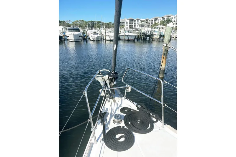 Slide: The Image of Bow view of 2013 Beneteau Sense 46 yacht docked at marina. - 71