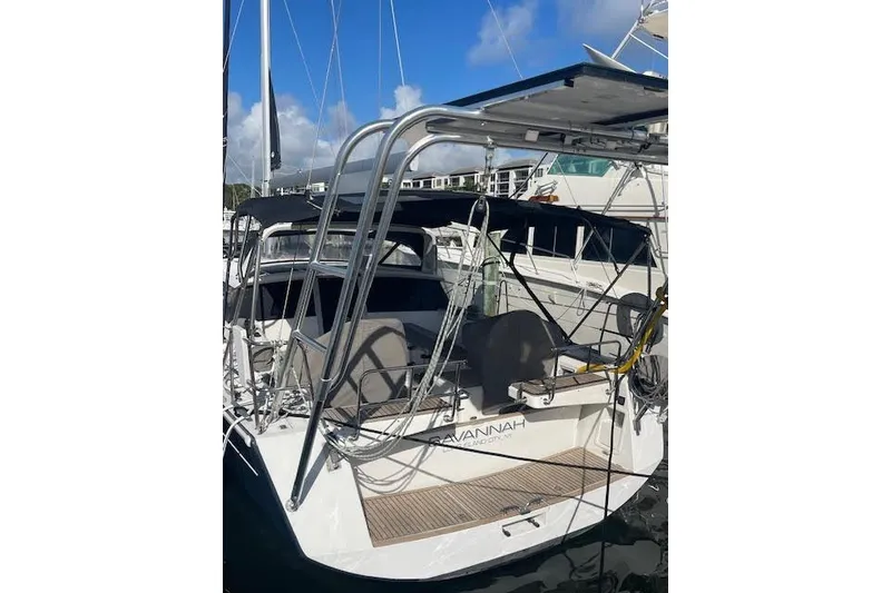 Slide: The Image of 2013 Beneteau Sense 46 yacht docked, featuring sleek design and modern amenities. - 82