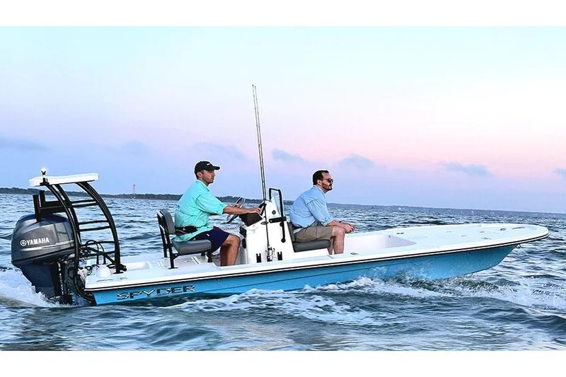 Slide: The Image of Manufacturer Provided Image: Two people fishing on a 2025 Spyder FX17 Flicker boat in calm waters. - 1