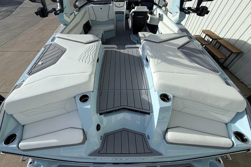 Slide: The Image of 2026 Nautique Super Air Nautique G21 boat interior with sleek seating and modern design. - 12