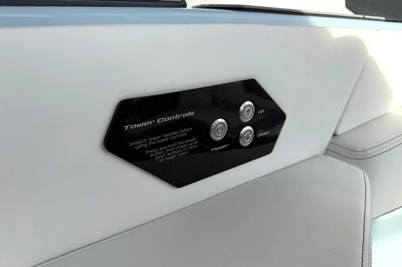 Slide: The Image of 2026 Nautique Super Air Nautique G21 tower controls on sleek interior panel. - 19