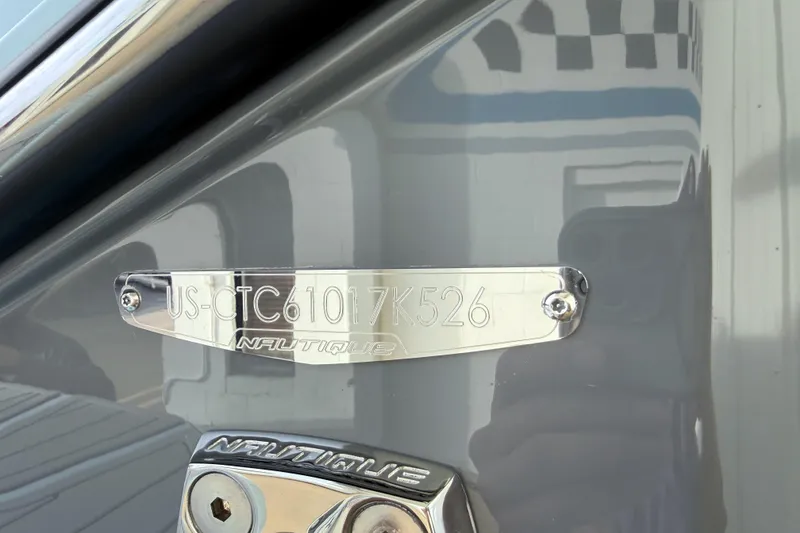 Slide: The Image of 2026 Nautique Super Air Nautique G21 hull identification number plate. - 35