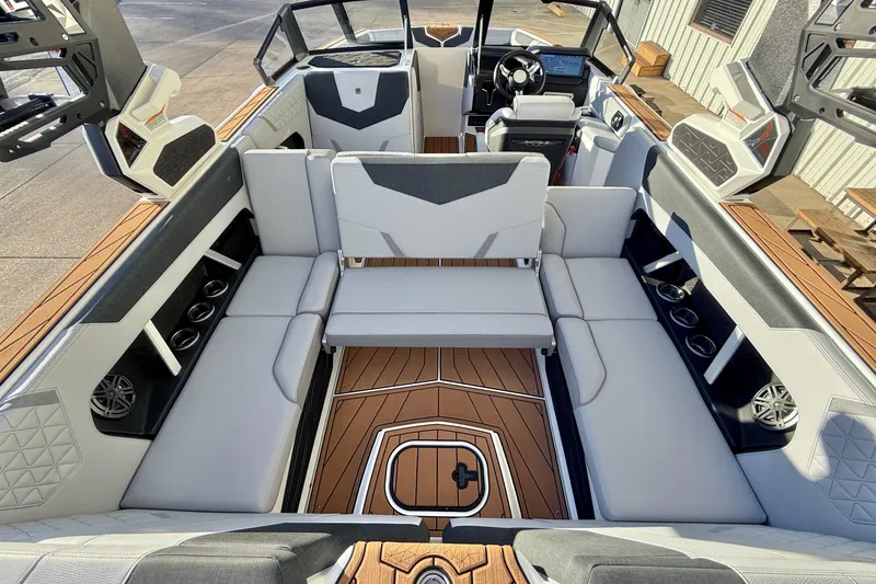 Slide: The Image of 2026 Nautique Super Air Nautique GS22 interior with luxurious seating and modern design. - 17