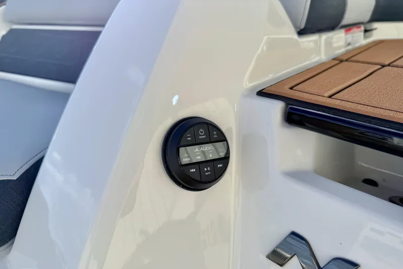Slide: The Image of 2026 Nautique Super Air Nautique GS22 boat with JL Audio control panel. - 28