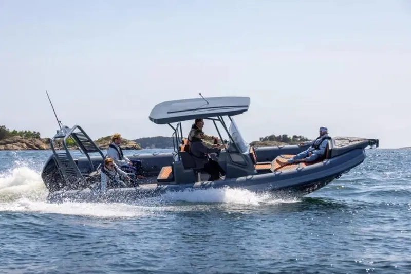 The Image of 2025 Highfield Sport 760 boat cruising on open water with passengers. - 0