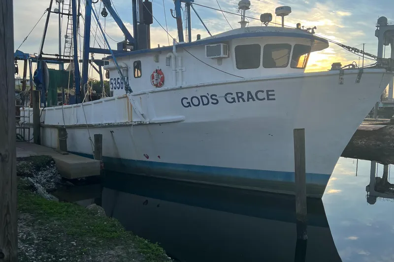 Slide: The Image of Commercial Butterfish Fishing Trawler "God's Grace" docked at sunset, 1971 model. - 3