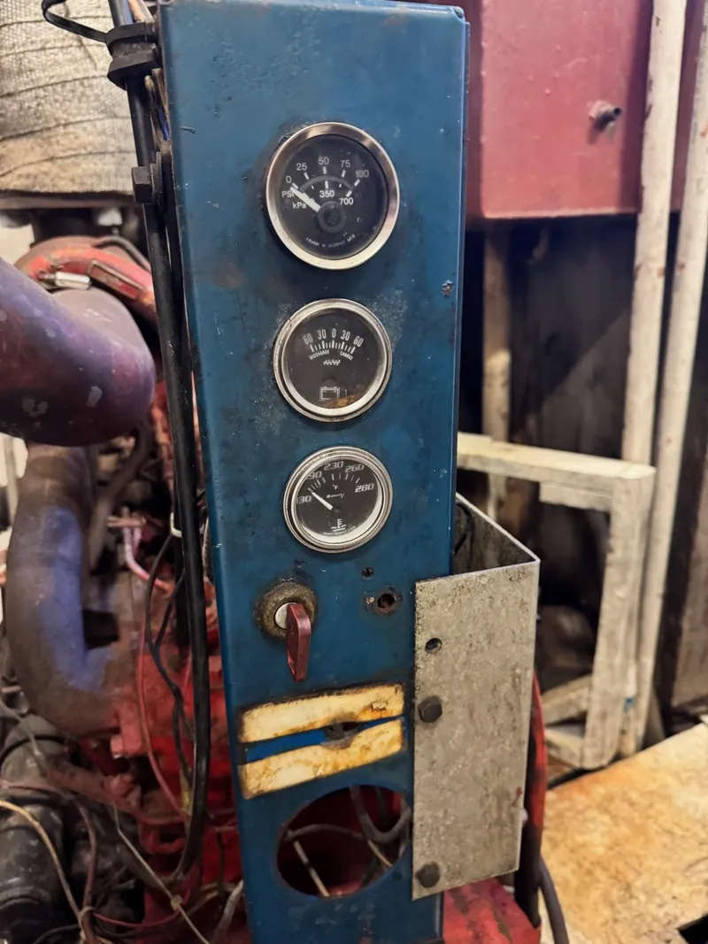 Slide: The Image of Control panel of a 1971 Butterfish Fishing Trawler with gauges and wiring. - 4