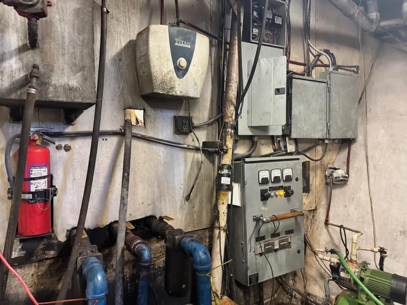 Slide: The Image of Engine room of 1971 Butterfish Fishing Trawler with electrical panels and equipment. - 5