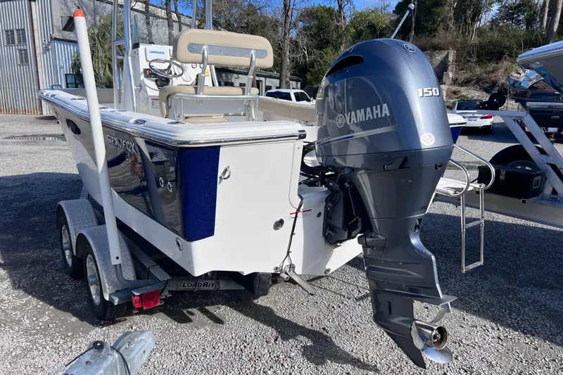 Slide: The Image of 2015 Sea Fox 199 Commander boat with Yamaha 150 outboard engine on trailer. - 2