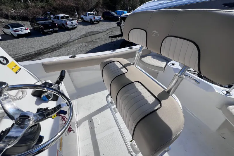 Slide: The Image of 2015 Sea Fox 199 Commander boat interior with steering wheel and seating. - 7