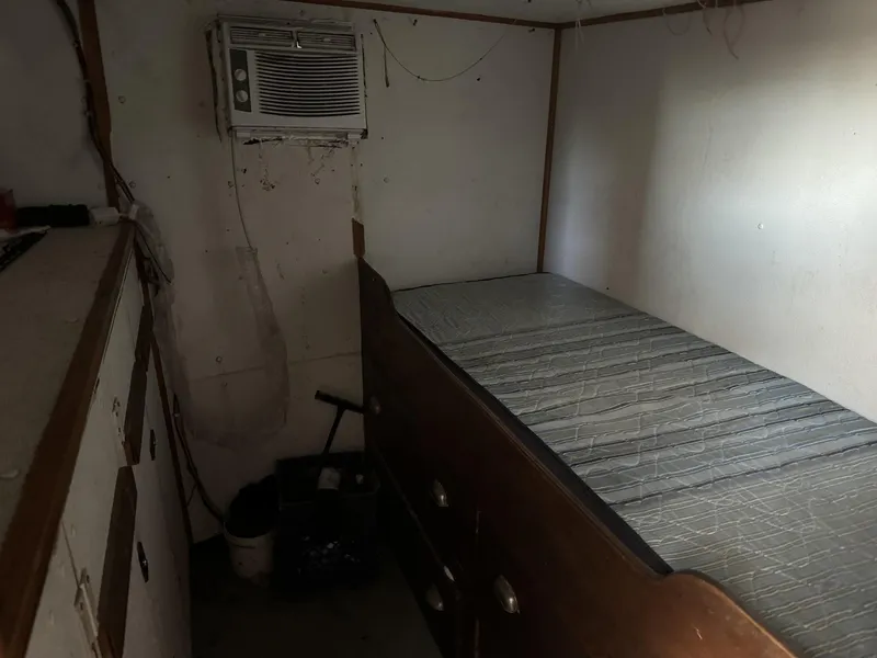 Slide: The Image of Small cabin interior of 1972 shrimp freezer trawler with bed and air conditioner. - 8