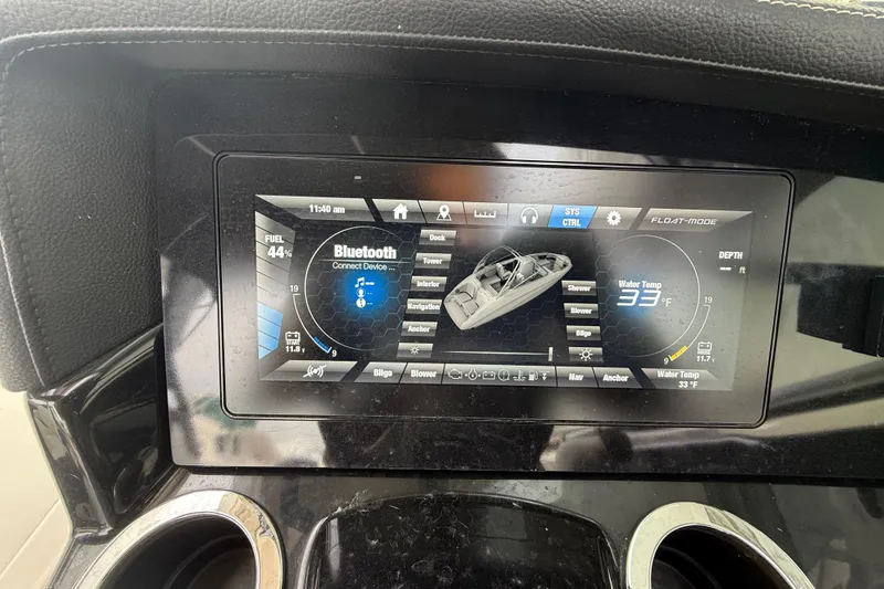 Slide: The Image of Dashboard display of a 2019 Yamaha Boats 242 Limited S, showing Bluetooth and water temperature. - 15