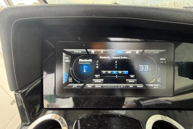 Slide: The Image of Dashboard of 2019 Yamaha Boats 242 Limited S showing Bluetooth and water temperature. - 16