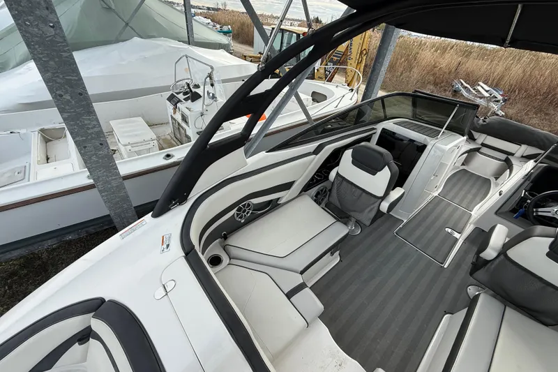 Slide: The Image of 2019 Yamaha Boats 242 Limited S interior with sleek seating and modern design. - 3