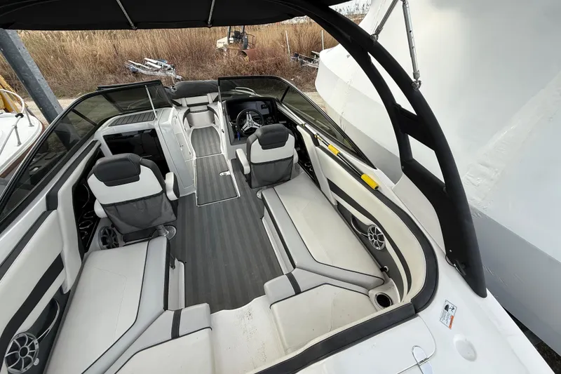 Slide: The Image of 2019 Yamaha Boats 242 Limited S interior with sleek seating and modern design. - 4