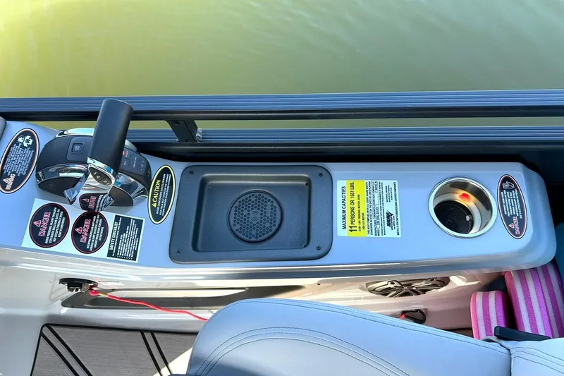 Slide: The Image of Control panel of 2020 Harris FloteBote Solstice 230 pontoon boat with safety labels. - 35