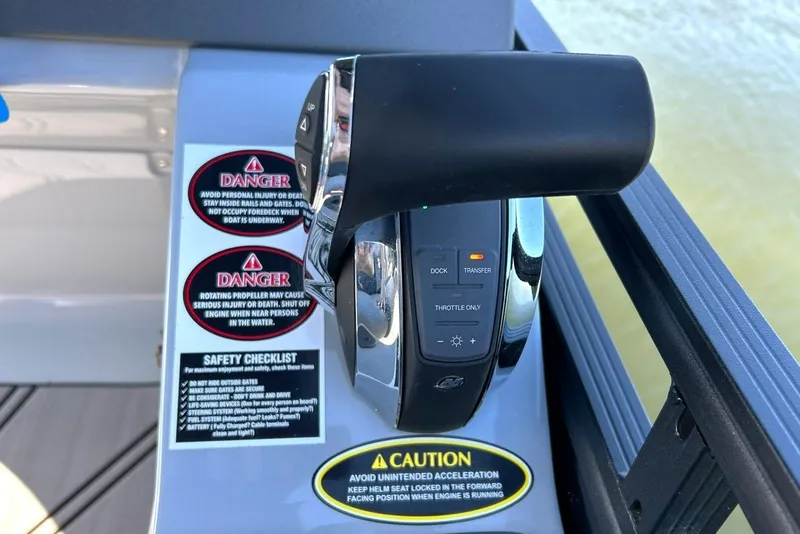 Slide: The Image of Throttle control and safety warnings on 2020 Harris FloteBote Solstice 230 boat. - 36