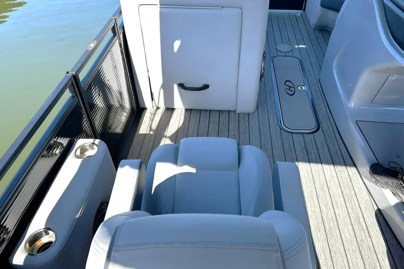 Slide: The Image of 2020 Harris FloteBote Solstice 230 interior with seating and cup holders. - 43