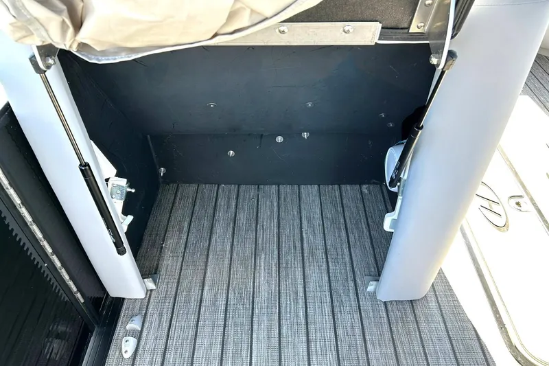 Slide: The Image of Interior view of 2020 Harris FloteBote Solstice 230 boat with striped flooring. - 44