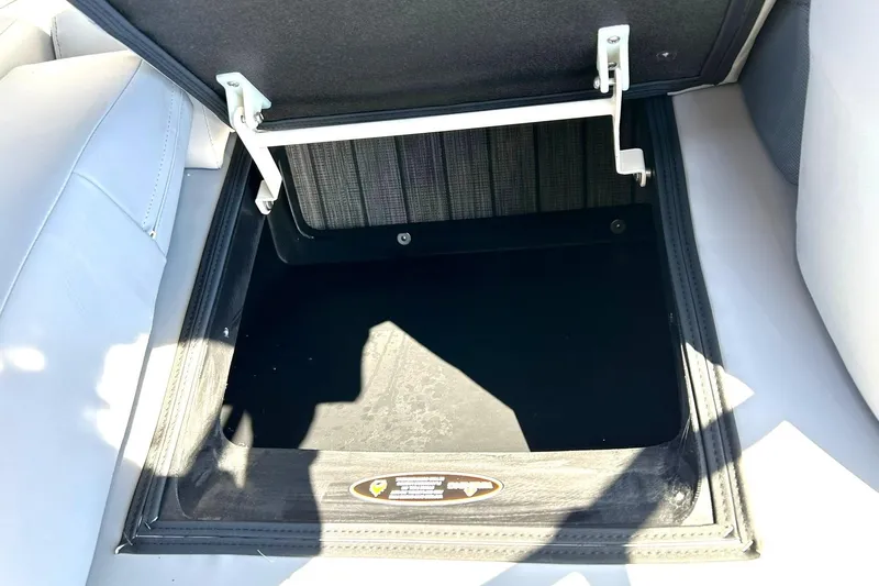 Slide: The Image of Open storage compartment in 2020 Harris FloteBote Solstice 230 boat. - 48