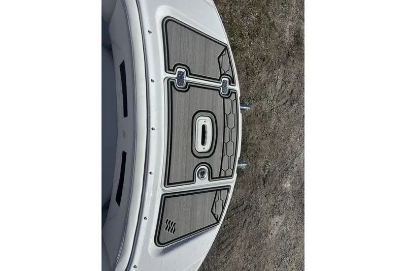 Slide: The Image of 2023 Four Winns HD3 boat deck with sleek design and textured surface. - 13