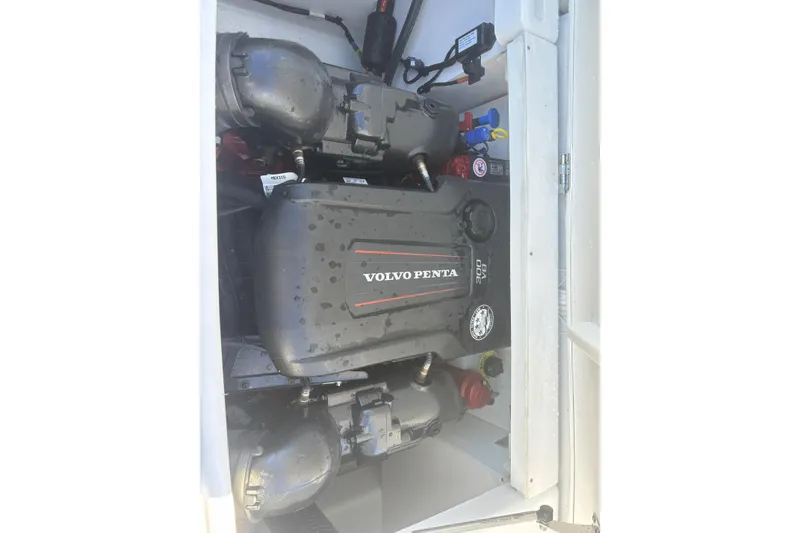 Slide: The Image of 2023 Four Winns HD3 boat engine compartment with Volvo Penta engine. - 34