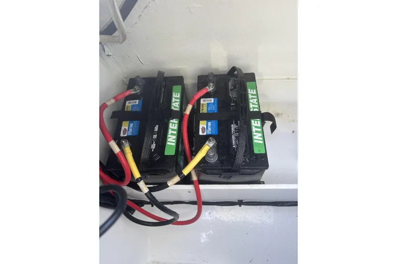Slide: The Image of Two Interstate batteries installed in a 2023 Four Winns HD3 boat. - 35
