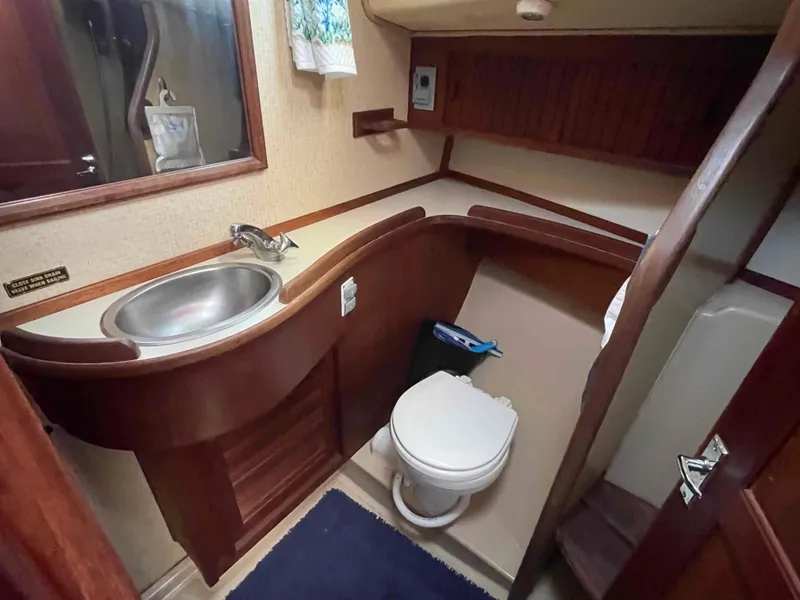 Slide: The Image of Storage compartment inside a 1990 Island Packet 35 Cutter sailboat. - 20