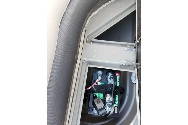 Slide: The Image of Battery compartment of 2022 Sun Tracker Bass Buggy 16 XL Select boat. - 21