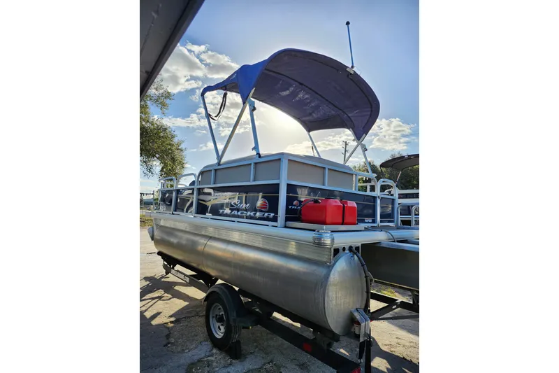 Slide: The Image of 2022 Sun Tracker Bass Buggy 16 XL Select pontoon boat with canopy and fuel tanks. - 4