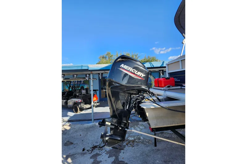 Slide: The Image of 2022 Sun Tracker Bass Buggy 16 XL Select with Mercury outboard motor. - 7