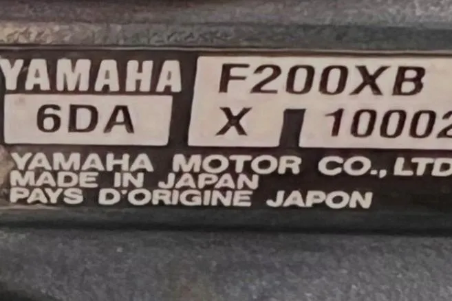 Slide: The Image of Yamaha F200XB engine label on 2013 Scout 275 LXF, made in Japan. - 13